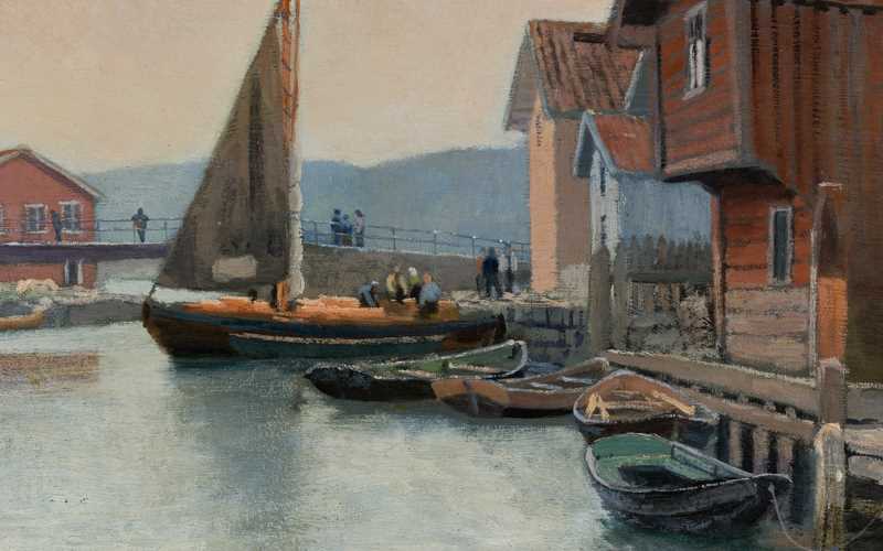 A Skagen painting showing boats anchored to a quay with wooden houses and people in one of the boats and on a bridge.